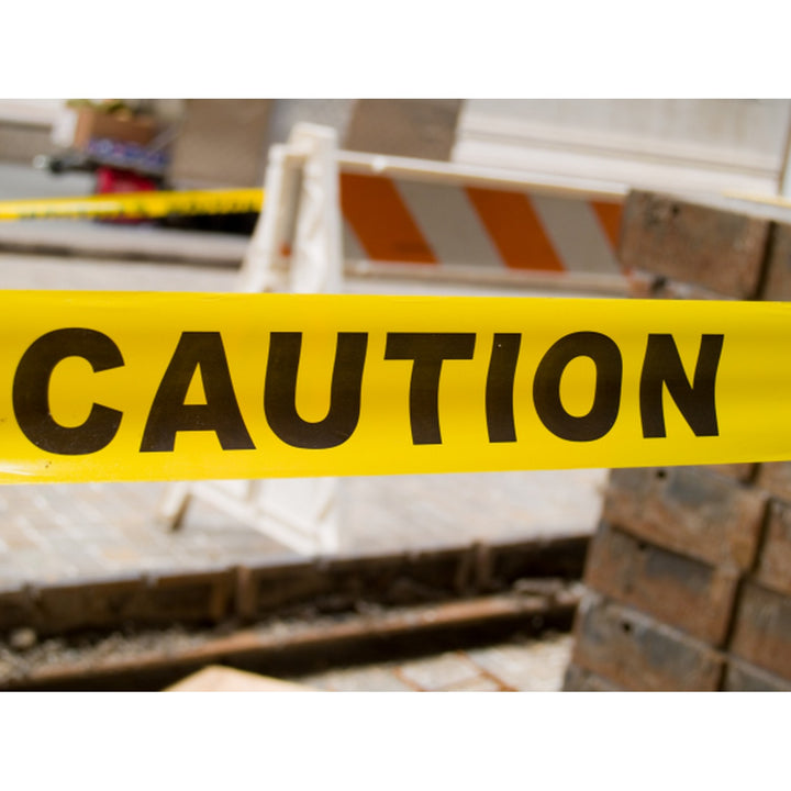 Johnson 3332 Standard Yellow "Caution" Tape - 3" x 1000'